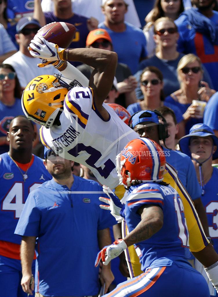 John Raoux LSU wide receiver Justin Jefferson (2) catches a pass over Florida defensive back C.J. McWilliams, right, during the first half of an NCAA college football game, Saturday, Oct. 6, 2018, in Gainesville, Fla. (AP Photo/John Raoux)