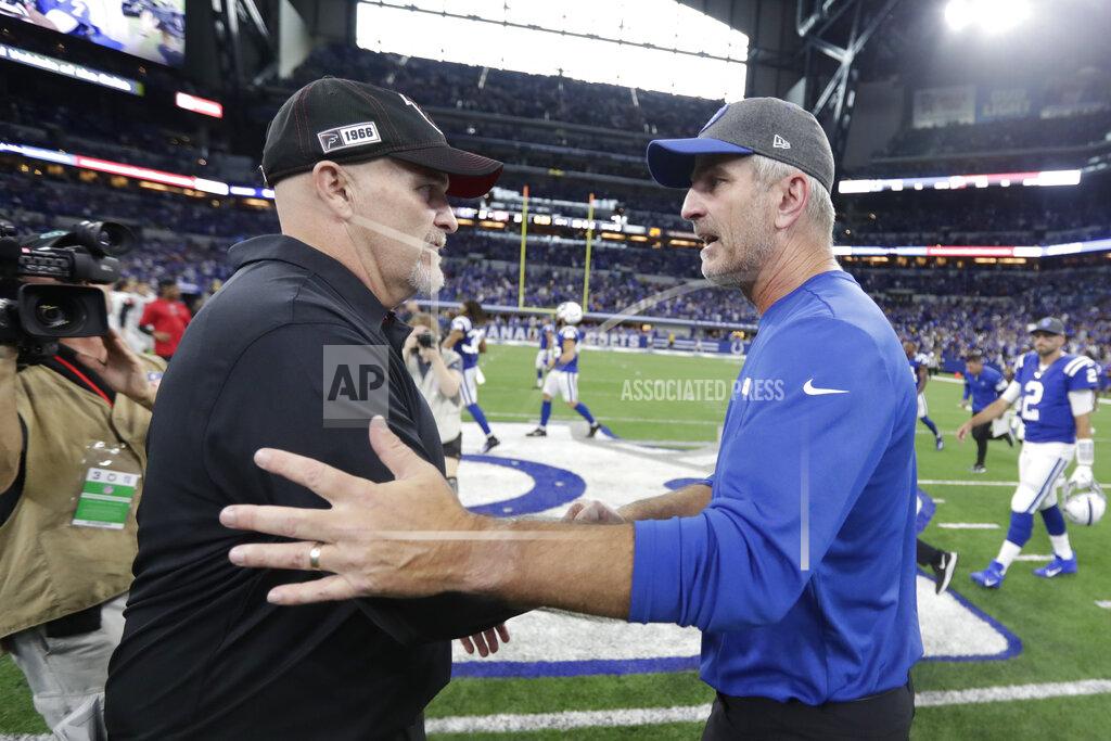 Michael Conroy Indianapolis Colts head coach Frank Reich, right, shakes hands with Atlanta Falcons head coach Dan Quinn following an NFL football game, Sunday, Sept. 22, 2019, in Indianapolis. Indianapolis won 27-24. (AP Photo/Michael Conroy)