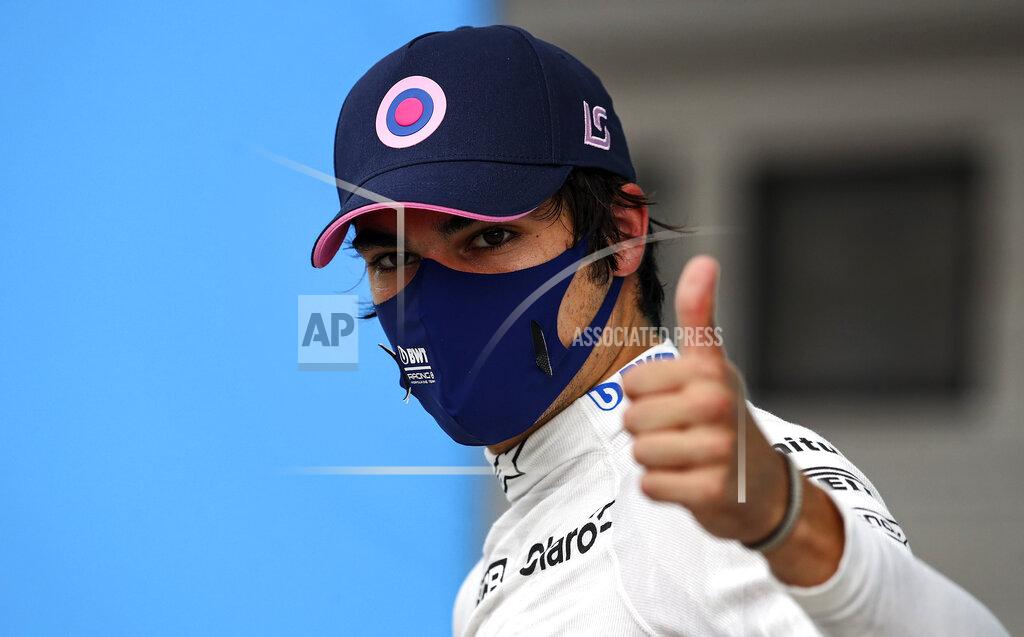 Mark Thompson Racing Point driver Lance Stroll of Canada reacts after the qualifying for the Hungarian Formula One Grand Prix at the Hungaroring racetrack in Mogyorod, Hungary, Saturday, July 18, 2020. The Hungarian F1 Grand Prix will be held on Sunday. (Mark Thompson/Pool via AP)
