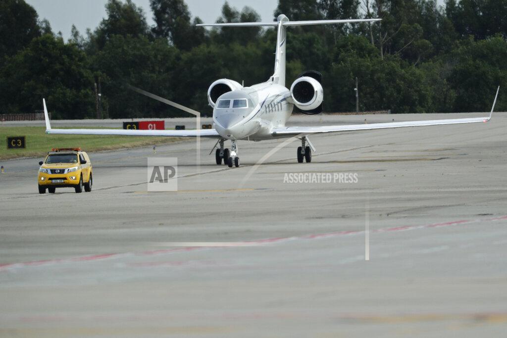 Lalo R. Villar A private jet with Spain's former King Juan Carlos on board taxis after landing at the Peinador airport in Vigo, north western Spain, Thursday, May 19, 2022. Spain's former King has returned to Spain Thursday for his first visit since leaving nearly two years ago amid a cloud of financial scandals. (AP Photo/Lalo R. Villar)
