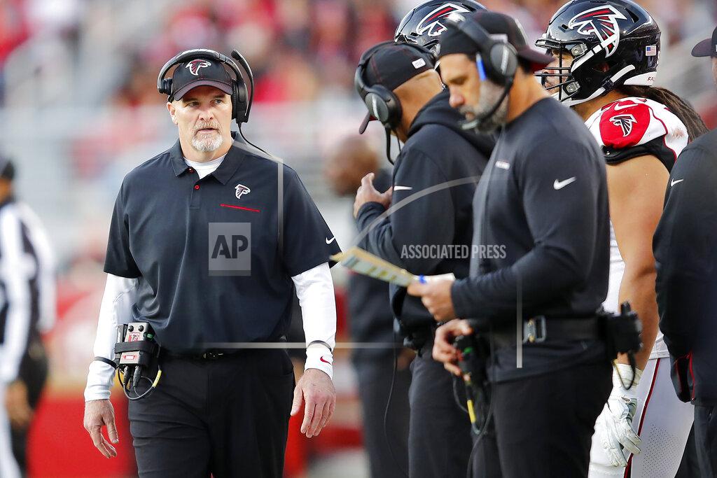 John Hefti Atlanta Falcons head coach Dan Quinn walks on the sideline during the second half of an NFL football game against the San Francisco 49ers in Santa Clara, Calif., Sunday, Dec. 15, 2019. (AP Photo/John Hefti)