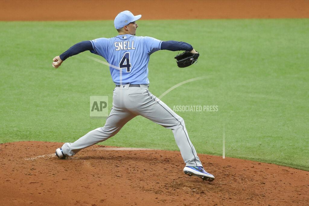 Mike Carlson FILE - In this Wednesday, July 8, 2020, file photo, Tampa Bay Rays' Blake Snell throws during baseball practice in St. Petersburg, Fla. (AP Photo/Mike Carlson, File)
