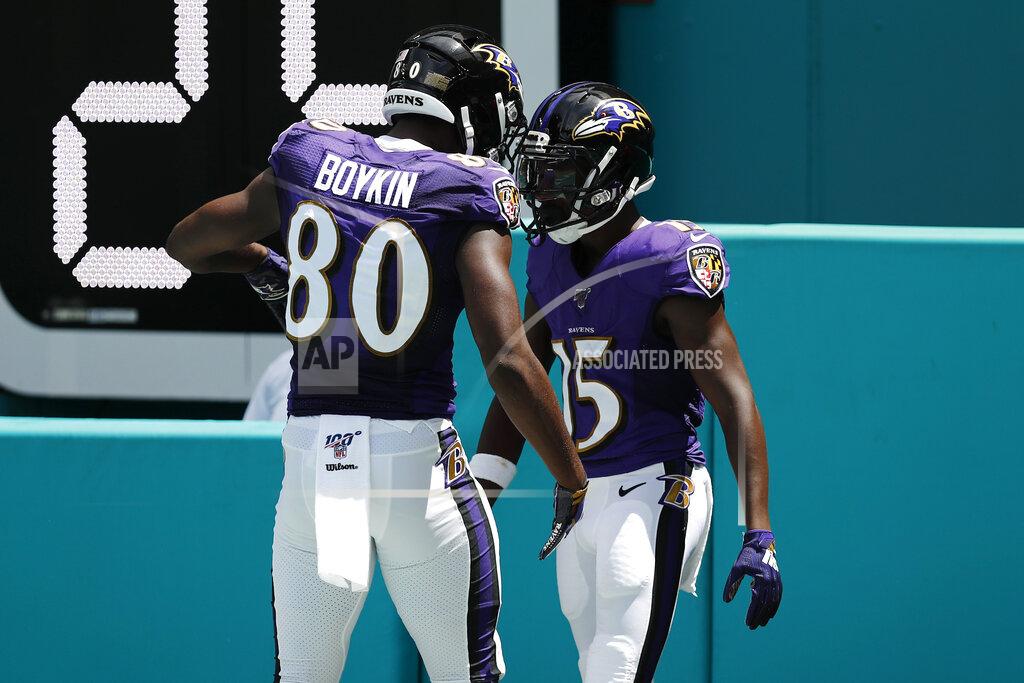 Brynn Anderson Baltimore Ravens wide receiver Miles Boykin (80) congratulates wide receiver Marquise Brown (15), after Brown scored a touchdown, during the first half at an NFL football game, Sunday, Sept. 8, 2019, in Miami Gardens, Fla. (AP Photo/Brynn Anderson)
