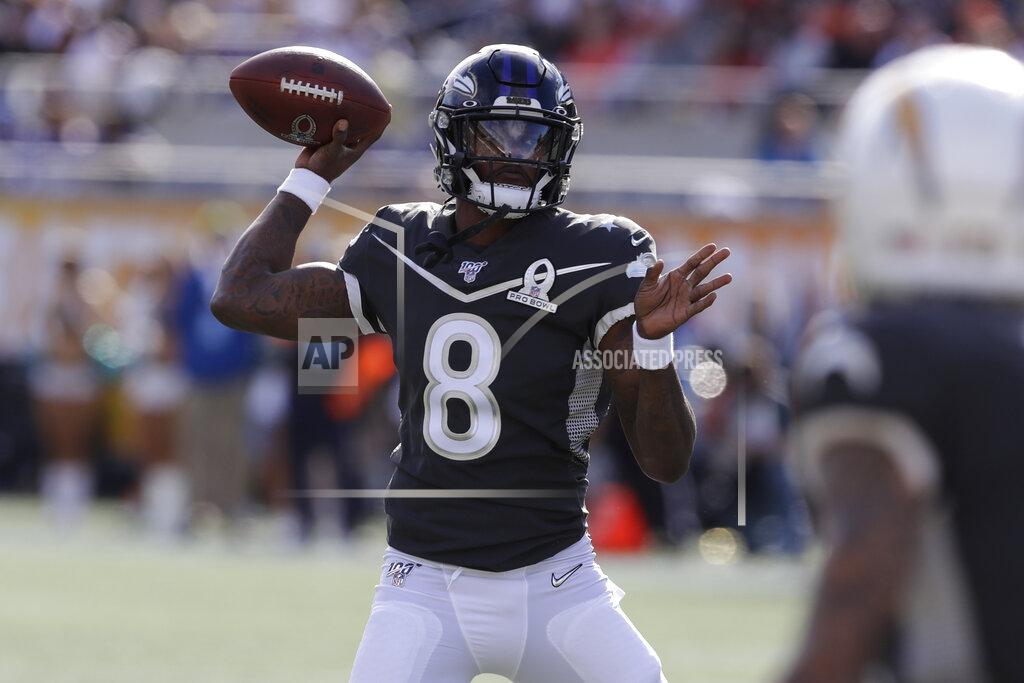 Chris O?Meara AFC quarterback Lamar Jackson, of the Baltimore Ravens, (8) looks to pass, during the first half of the NFL Pro Bowl football game against the NFC, Sunday, Jan. 26, 2020, in Orlando, Fla. (AP Photo/Chris O'Meara)