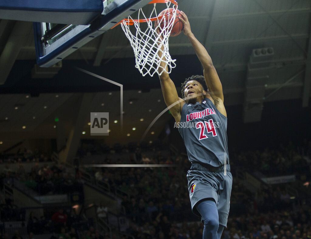 Michael Caterina Louisville's Dwayne Sutton (24) dunks against Notre Dame during an NCAA college basketball game, Saturday, Jan. 11, 2020, at Purcell Pavilion in South Bend, Ind. (Michael Caterina/South Bend Tribune via AP)