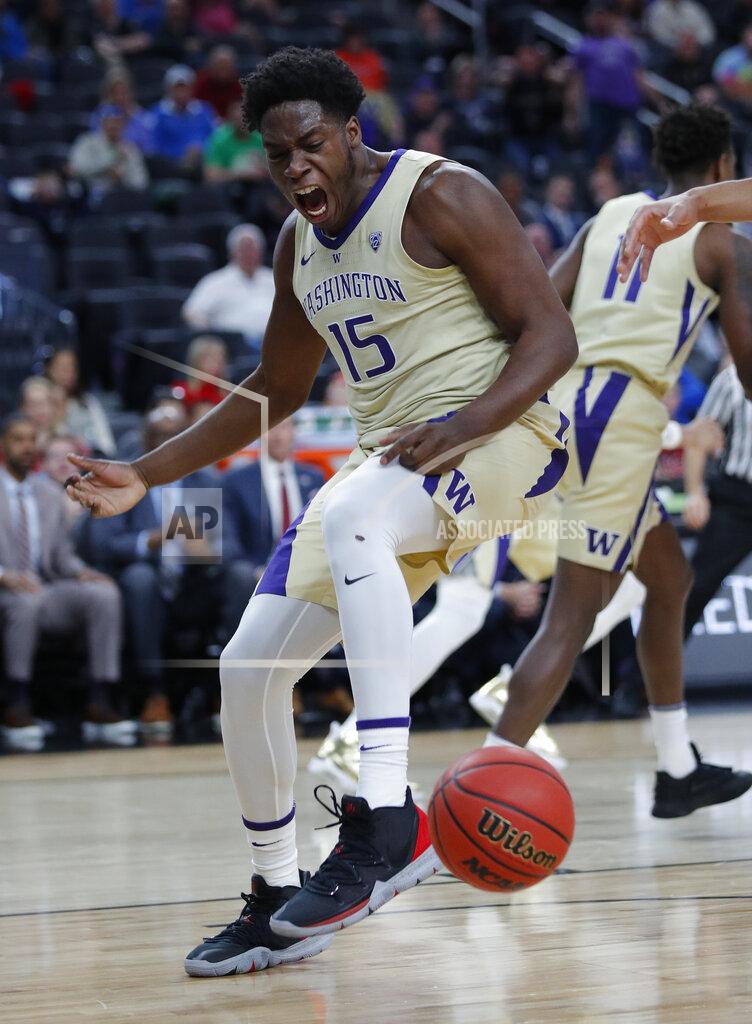 John Locher Washington's Noah Dickerson reacts after scoring against Southern California during the first half of an NCAA college basketball game in the quarterfinal round of the Pac-12 men's tournament Thursday, March 14, 2019, in Las Vegas. (AP Photo/John Locher)
