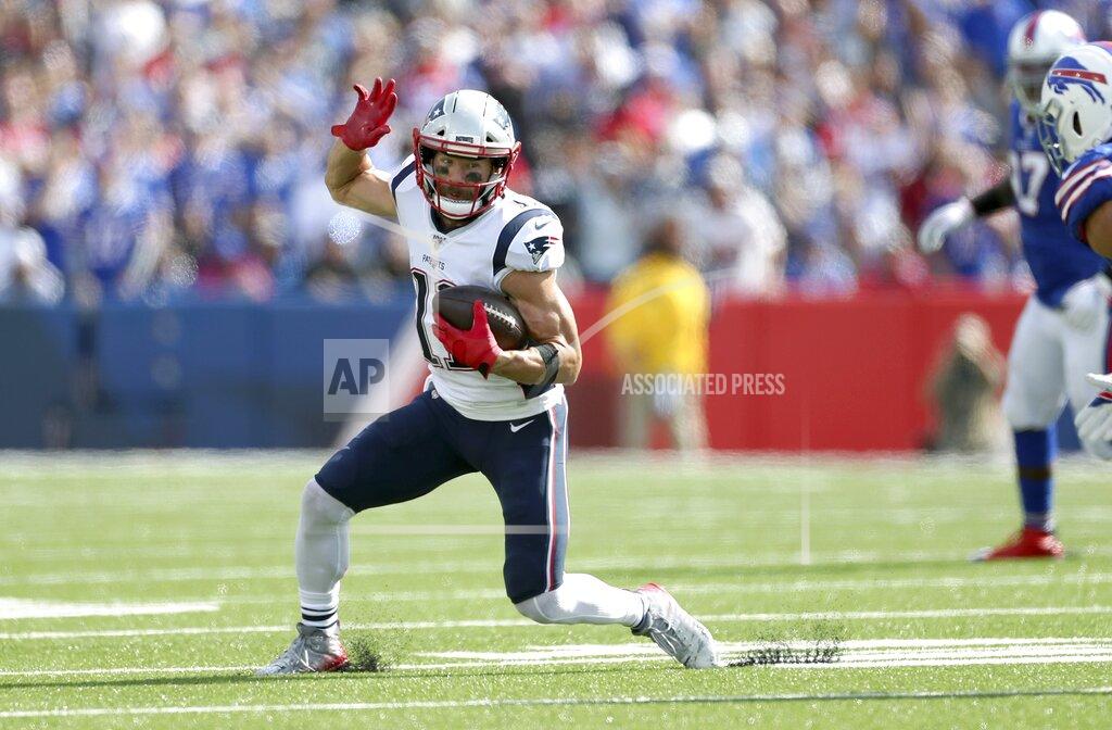 Ron Schwane New England Patriots wide receiver Julian Edelman runs after catching a pass in the first half of an NFL football game against the Buffalo Bills, Sunday, Sept. 29, 2019, in Orchard Park, N.Y. (AP Photo/Ron Schwane)