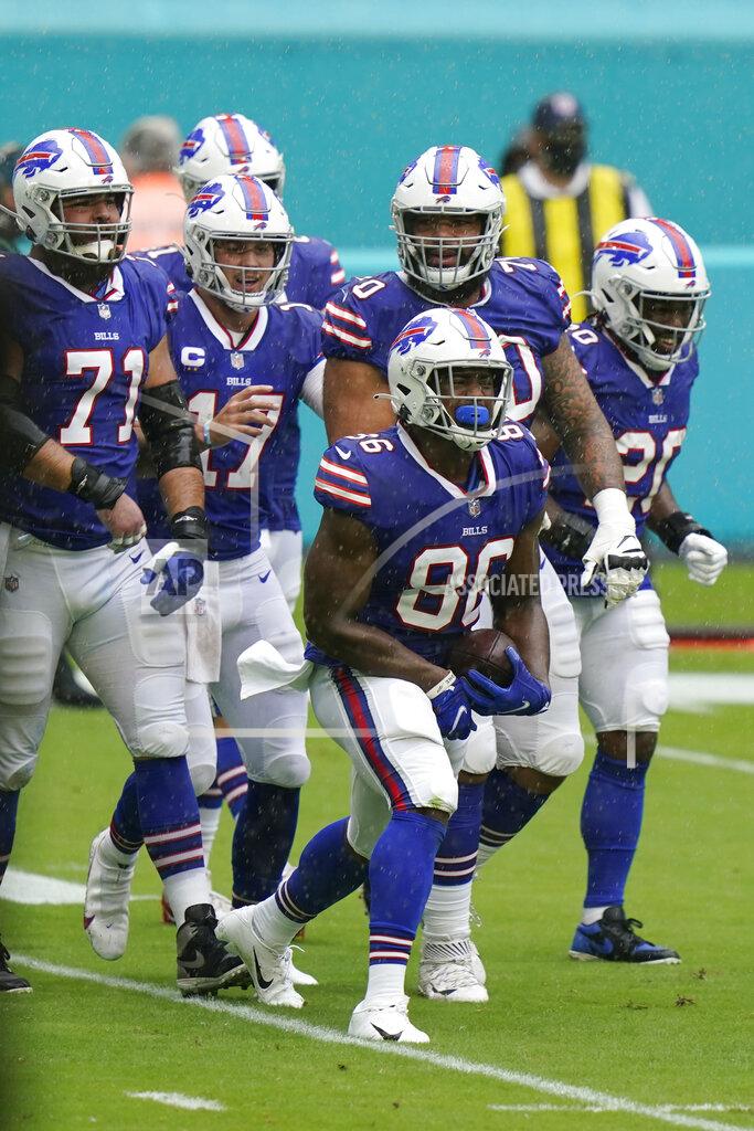 Lynne Sladky Buffalo Bills tight end Reggie Gilliam (86) celebrates with his teammates after scoring a touchdown, during the first half of an NFL football game against the Miami Dolphins, Sunday, Sept. 20, 2020, in Miami Gardens, Fla. (AP Photo/Lynne Sladky)