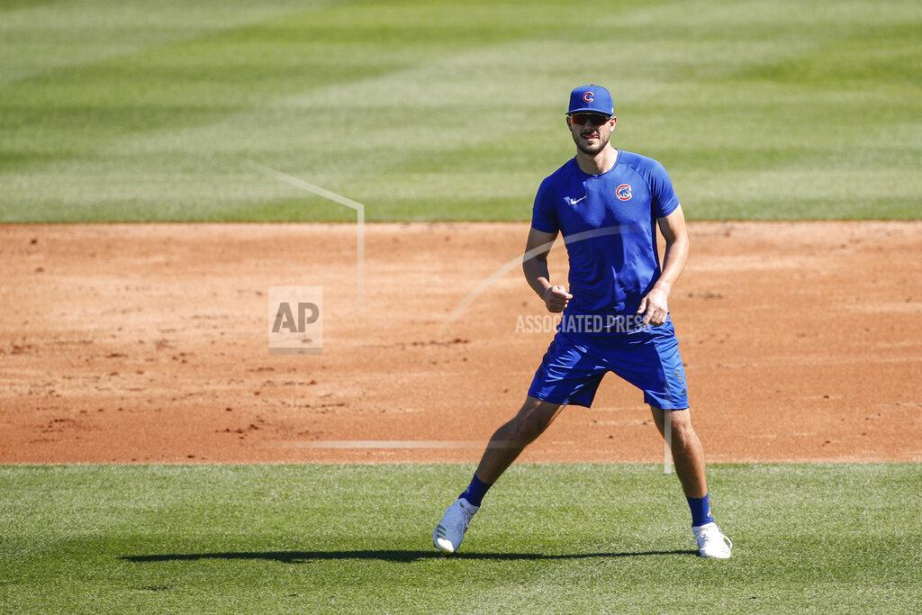 Kamil Krzaczynski Chicago Cubs third baseman Kris Bryant warms up during baseball practice at Wrigley Field on Friday, July 3, 2020 in Chicago. (AP Photo/Kamil Krzaczynski)