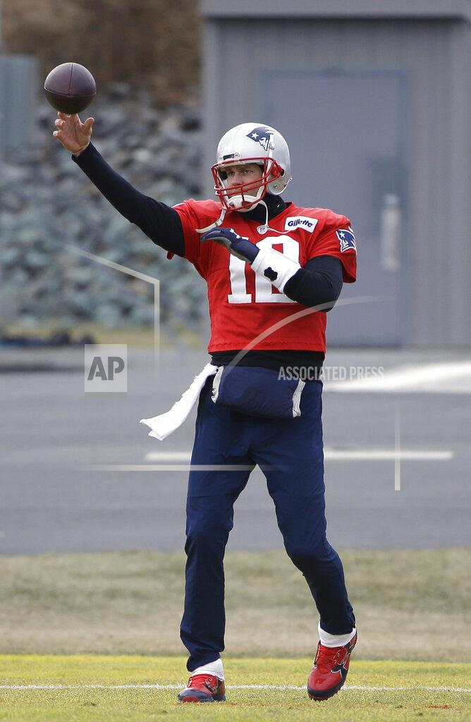 Steven Senne New England Patriots quarterback Tom Brady throws the ball while warming up during an NFL football practice, Wednesday, Jan. 16, 2019, in Foxborough, Mass. The Patriots are scheduled to face the Kansas City Chiefs in the AFC championship game, Sunday, Jan. 20, in Kansas City. (AP Photo/Steven Senne)