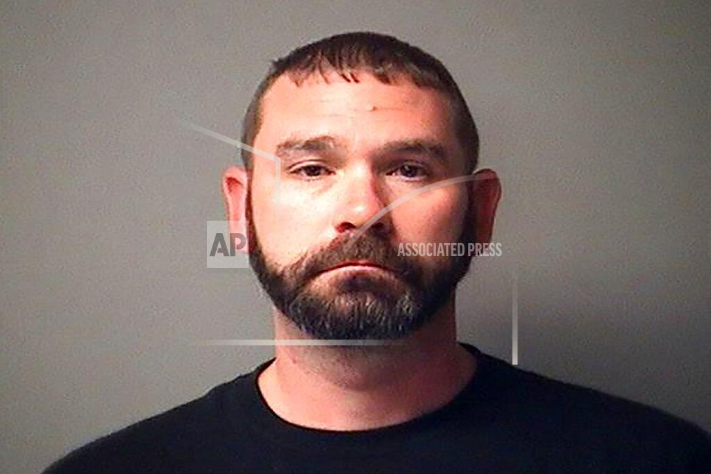Uncredited This undated photo provided by the Antrim County Jail in Bellaire, Mich, shows Shawn Fix. Fix is charged with terrorists acts and violating federal firearms laws. His attorney entered a not guilty plea on his behalf and bond was set at $250,000.( Antrim County Jail via AP)