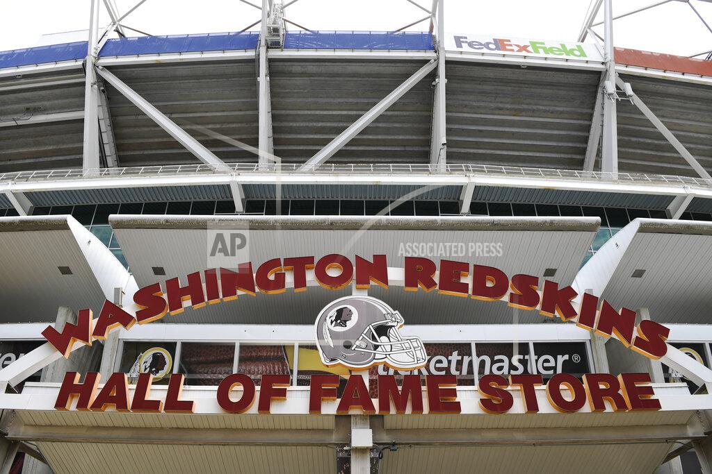 Susan Walsh Signs for the Washington Redskins are displayed outside FedEx Field in Landover, Md., Monday, July 13, 2020. The Washington NFL franchise announced Monday that it will drop the "Redskins" name and Indian head logo immediately, bowing to decades of criticism that they are offensive to Native Americans. (AP Photo/Susan Walsh)