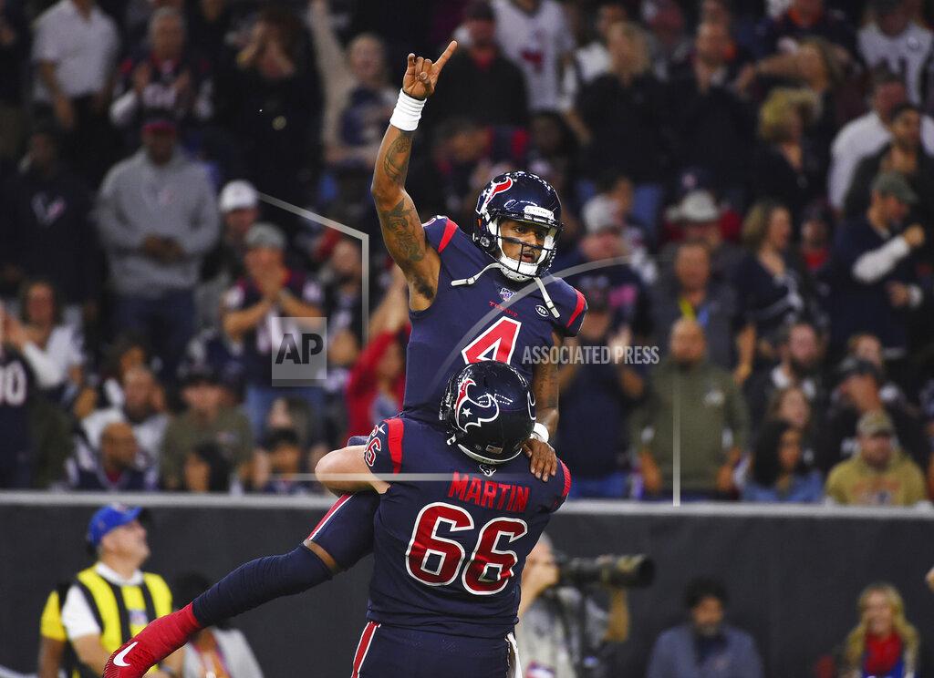 Eric Christian Smith Houston Texans quarterback Deshaun Watson (4) is lifted by center Nick Martin (66) as they celebrate a touchdown against the New England Patriots during the first half of an NFL football game Sunday, Dec. 1, 2019, in Houston. (AP Photo/Eric Christian Smith)