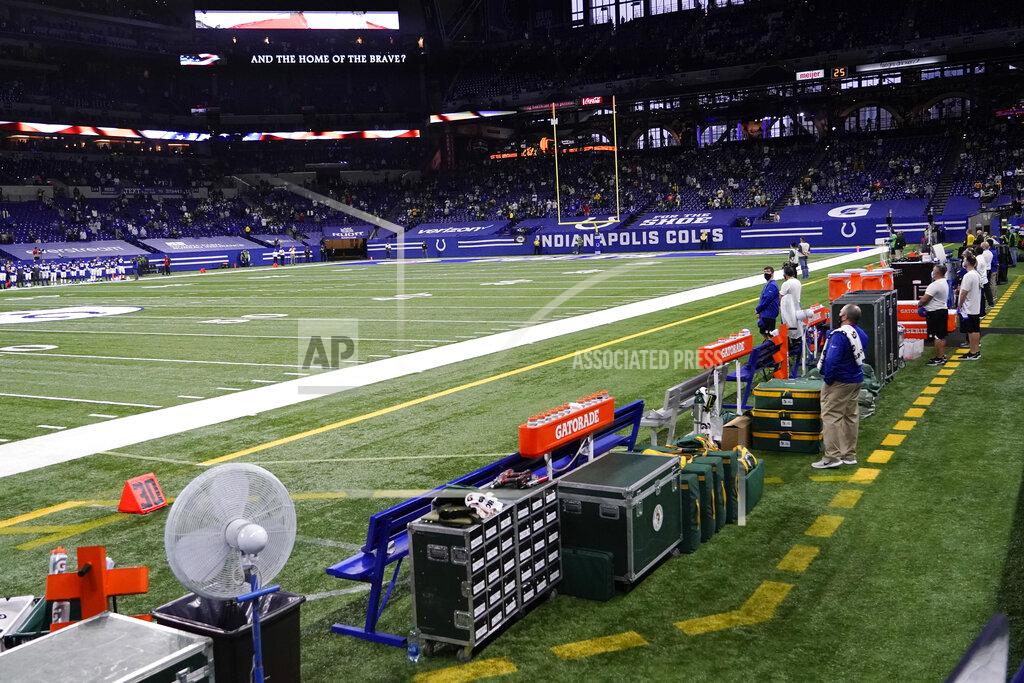 Aj Mast The Green Bay Packers sideline is empty during the national anthem before an NFL football game against the Indianapolis Colts, Sunday, Nov. 22, 2020, in Indianapolis. (AP Photo/AJ Mast)