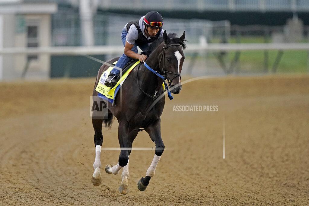Charlie Riedel Kentucky Derby entrant Super Stock works out at Churchill Downs Wednesday, April 28, 2021, in Louisville, Ky. The horse is co-owned by trainer Steve Asmussen's parents with a partner. (AP Photo/Charlie Riedel)
