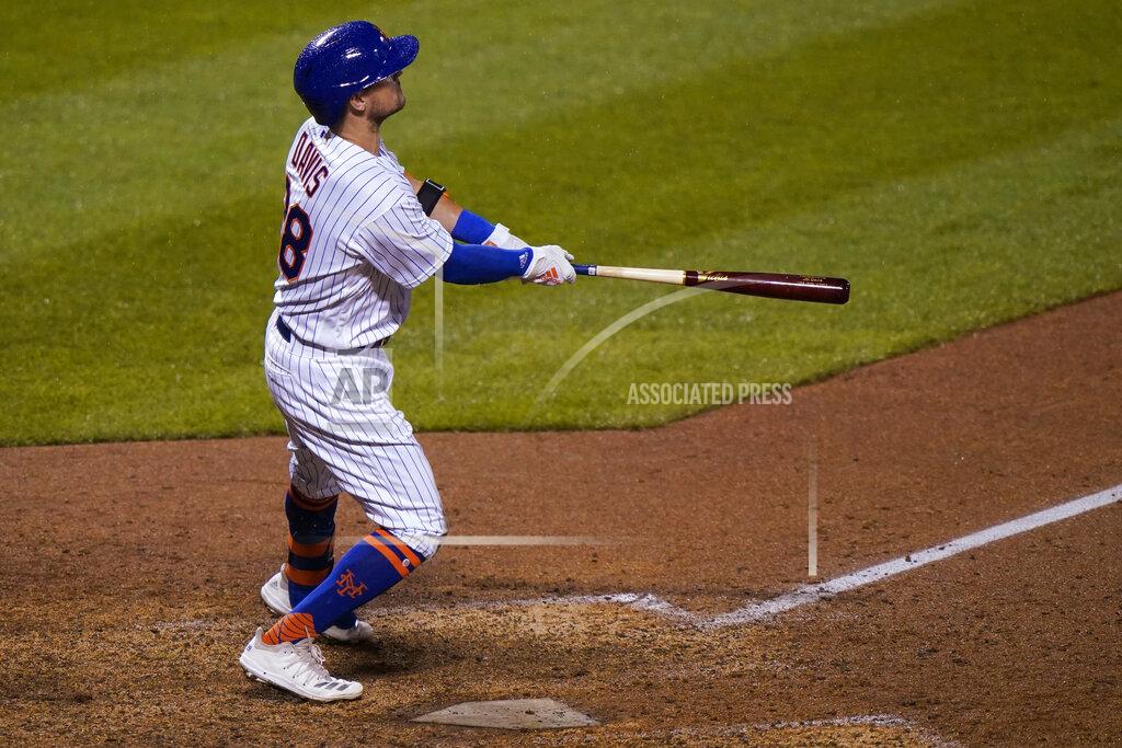 Kathy Willens New York Mets' J.D. Davis watches his game-tying solo home run during the ninth inning of the team's baseball game against the New York Yankees on Thursday, Sept. 3, 2020, in New York. (AP Photo/Kathy Willens)