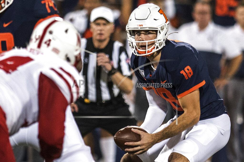 Holly Hart Illinois quarterback Brandon Peters (18) takes the snap in the first half of an NCAA college football game against Nebraska, Saturday, Sept. 21, 2019, in Champaign, Ill. (AP Photo/Holly Hart)