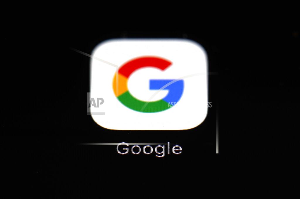 FILE - This March 19, 2018, file photo shows a Google app in Baltimore. Google will try to make a bigger splash in the smartphone market with a cheaper high-end model while it also aims to expand its presence on bigger screens with a new TV service. The products unveiled Wednesday, Sept. 30, 2020, focus on two areas where Google has struggled to make significant inroads. (AP Photo/Patrick Semansky, File)