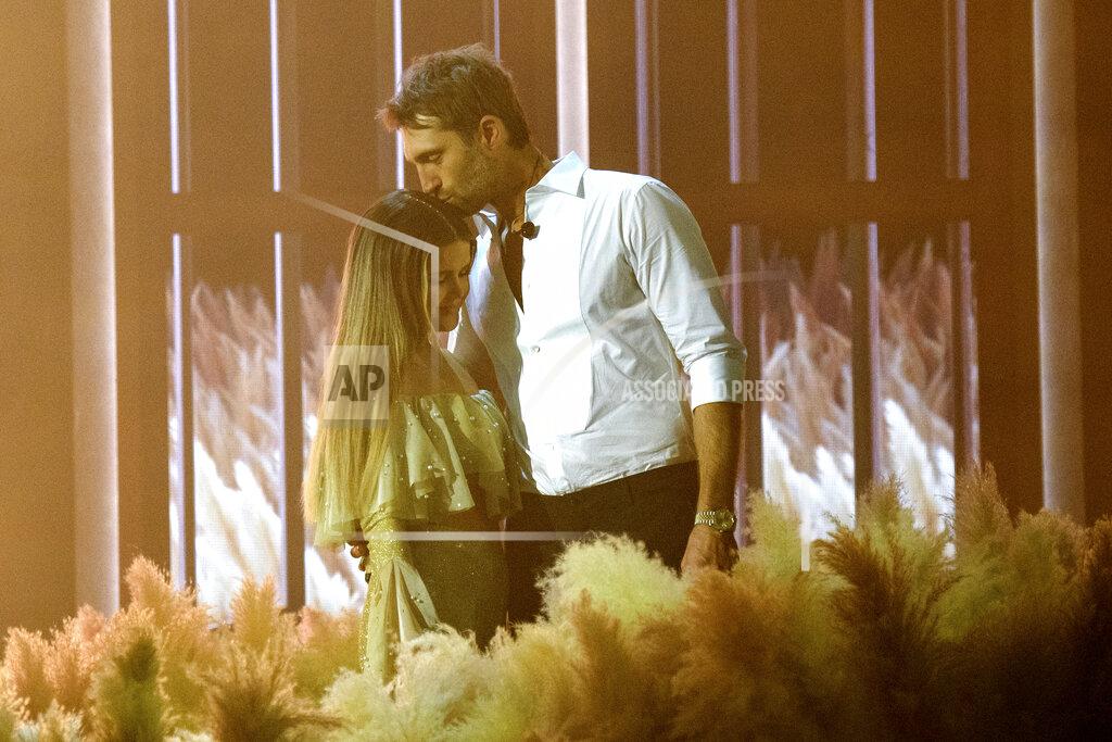 Amy Harris Maren Morris, left, and Ryan Hurd perform at the 56th annual Academy of Country Music Awards on Friday April 16, 2021 at the Ryman Auditorium in Nashville, Tenn. The awards show airs on April 18 with both live and prerecorded segments. (Photo by Amy Harris/Invision/AP)