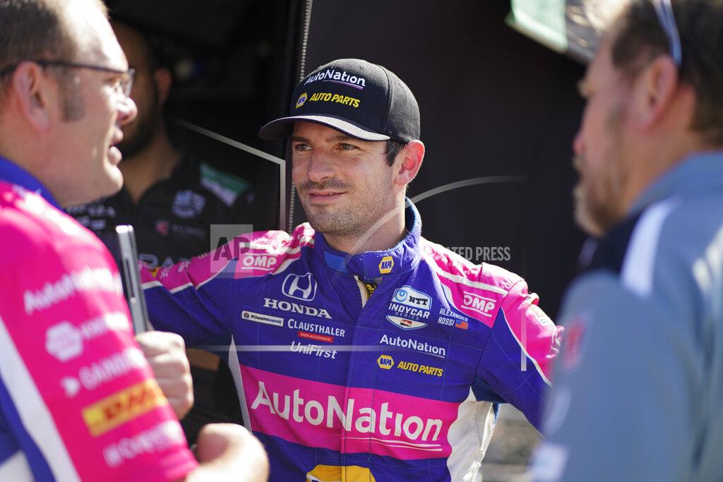 Darron Cummings Alexander Rossi talks with his car following practice for the IndyCar auto race at Indianapolis Motor Speedway, Friday, May 13, 2022, in Indianapolis. (AP Photo/Darron Cummings)