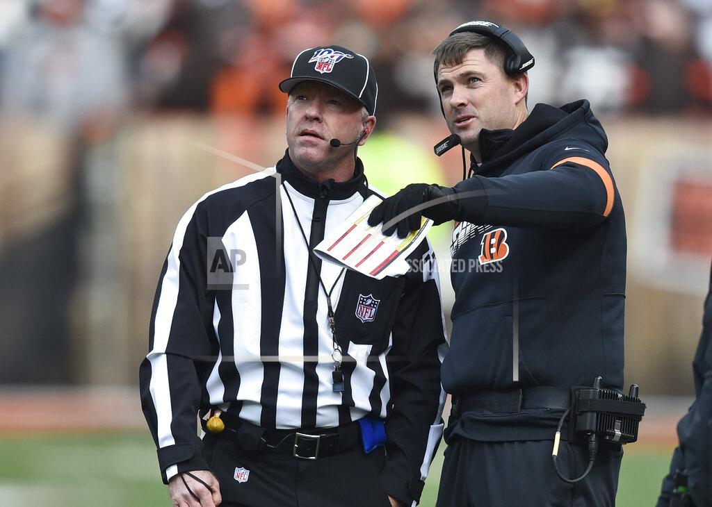 David Richard Cincinnati Bengals head coach Zac Taylor, right, talks with an official during the first half of an NFL football game against the Cleveland Browns, Sunday, Dec. 8, 2019, in Cleveland. (AP Photo/David Richard)
