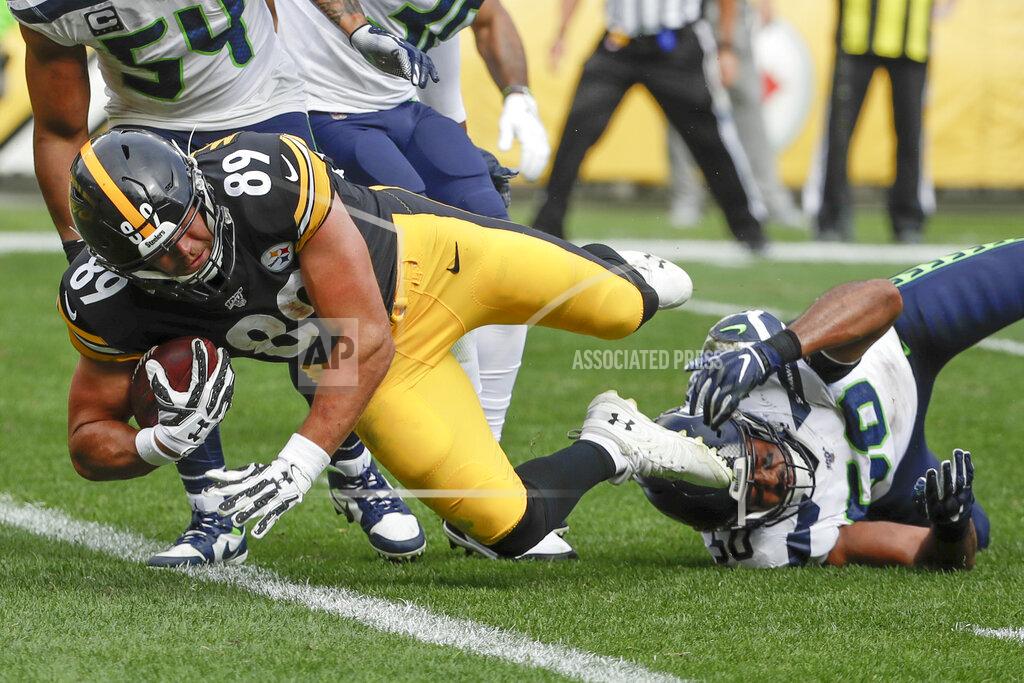 Gene J. Puskar Pittsburgh Steelers tight end Vance McDonald (89) dives to score after getting past Seattle Seahawks outside linebacker K.J. Wright (50) after making a catch in the second half of an NFL football game, Sunday, Sept. 15, 2019, in Pittsburgh. The Seahawks beat the Steelers 28-26. (AP Photo/Gene J. Puskar)