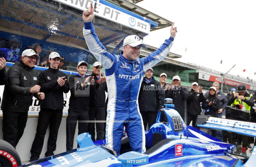 Michael Conroy FILE - In this May 10, 2019, file photo, Felix Rosenqvist, of Sweden, celebrates after winning the pole during qualifications for the Indy GP IndyCar auto race at Indianapolis Motor Speedway in Indianapolis. Rosenqvist has been hired by Arrow McLaren SP for the 2021 IndyCar season. (AP Photo/Michael Conroy, File)