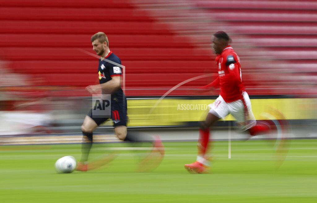 Kai Pfaffenbach Leipzig's Timo Werner in action with 1.FSV Mainz 05's Moussa Niakhate during a German Bundesliga soccer match between FSV Mainz 05 and RB Leipzig in Mainz, Germany, Sunday, May 24, 2020. (Kai Pfaffenbach/pool via AP)