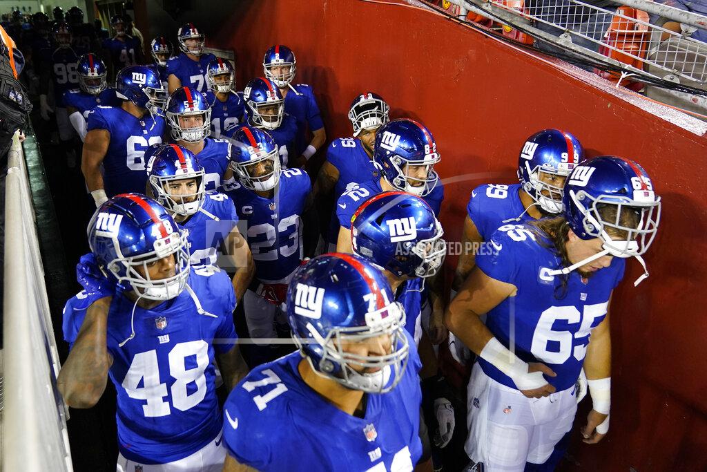 Alex Brandon Members of the New York Giants wait in the tunnel to take the field before the start of first half of an NFL football game against the Washington Football Team, Thursday, Sept. 16, 2021, in Landover, Md. (AP Photo/Alex Brandon)