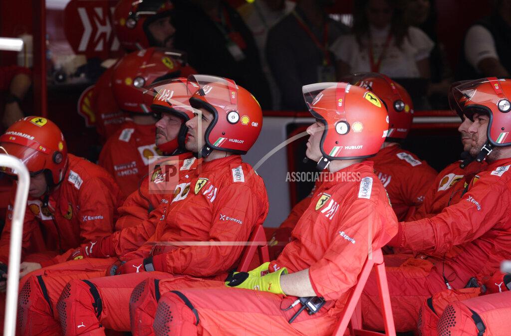 Amanda Perobelli Ferrari mechanics at the pits during the Brazilian Formula One Grand Prix at the Interlagos race track in Sao Paulo, Brazil, Sunday, Nov. 17, 2019. (Amanda Perobelli/Pool Photo via AP)