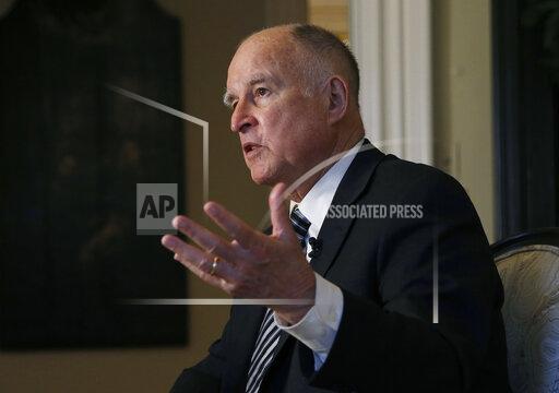 FILE - Then-California Gov. Jerry Brown talks during an interview in Sacramento, Calif., on Dec. 18, 2018. When former Gov. Brown signed the nation's first law requiring that women sit on corporate boards of publicly traded companies, he suggested it might not survive legal challenges. Three years later, a judge will begin hearing evidence on Wednesday, Dec. 1, 2021, in Los Angeles Superior Court that could undo a law that has already been credited with giving more women a seat in boardrooms. (AP Photo/Rich Pedroncelli, File)