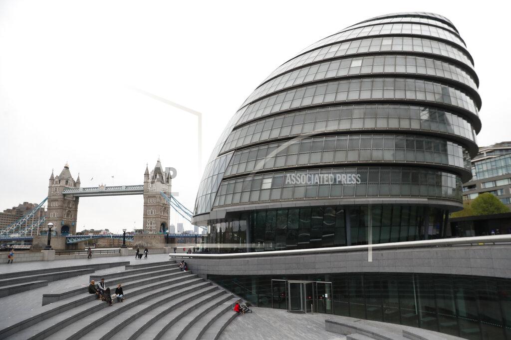 Alastair Grant A view of Tower Bridge and City Hall on the South Bank of the River Thames in London, Wednesday, April 28, 2021. Brexit and the coronavirus pandemic have hit London in a perfect storm. In 2021, the city has less people, fewer businesses, starker divisions and tougher choices than anyone could have expected. On May 6, Londoners will elect a mayor, whose performance will help determine whether this is the start of a period of decline for Europe's biggest city — or a chance to do things better. (AP Photo/Alastair Grant)