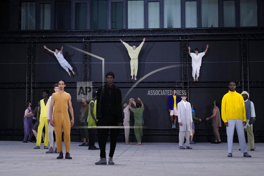 Francois Mori Models wear creations as part of Issey Miyake Homme Plisse men's Spring Summer 2023 collection presented in Paris, France, Thursday, June 23, 2022. (AP Photo/Francois Mori)