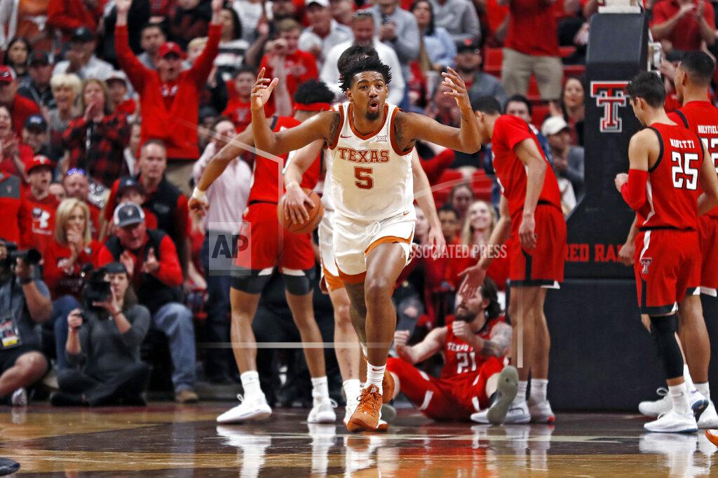 Brad Tollefson Texas' Royce Hamm Jr. (5) reacts as a foul is called against him during the first half of an NCAA college basketball game against Texas Tech, Saturday, Feb. 29, 2020, in Lubbock, Texas. (AP Photo/Brad Tollefson)
