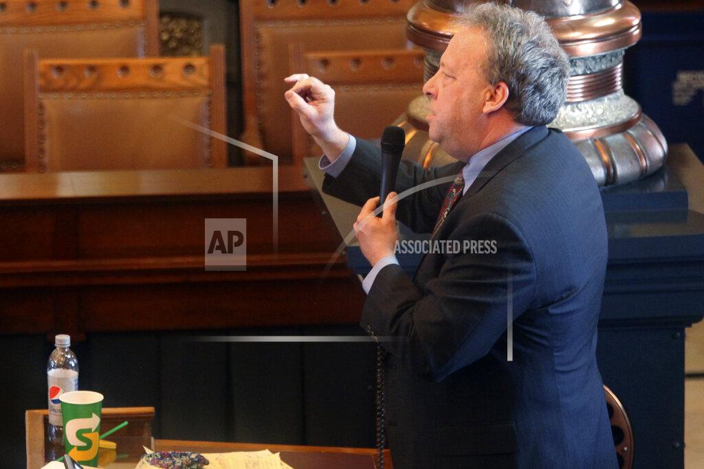 John Hanna In this photo from Thursday, Feb. 4, 2021, Kansas state Sen. Tom Holland, D-Baldwin City, speaks against a resolution condemning Democratic Gov. Laura Kelly's policy of making prison inmates eligible for COVID-19 vaccines now, during a Senate debate at the Statehouse in Topeka, Kan. Holland calls the measure "a political stunt." (AP Photo/John Hanna)