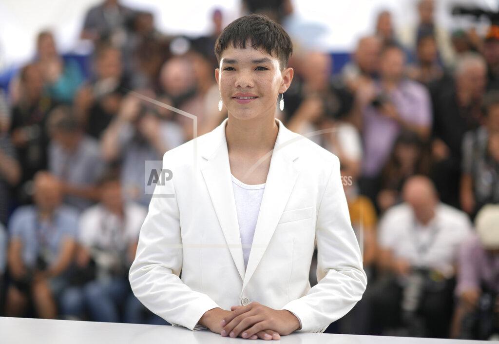 Petros Giannakouris LaDainian Crazy Thunder poses for photographers at the photo call for the film 'War Ponyr' at the 75th international film festival, Cannes, southern France, Saturday, May 21, 2022. (AP Photo/Petros Giannakouris)