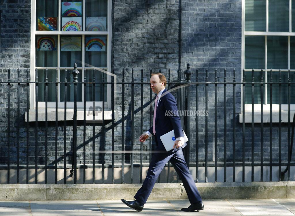 Frank Augstein Britain's Health Secretary Matt Hancock arrives at 10 Downing Street, in London, Wednesday, April 22, 2020. (AP Photo/Frank Augstein)