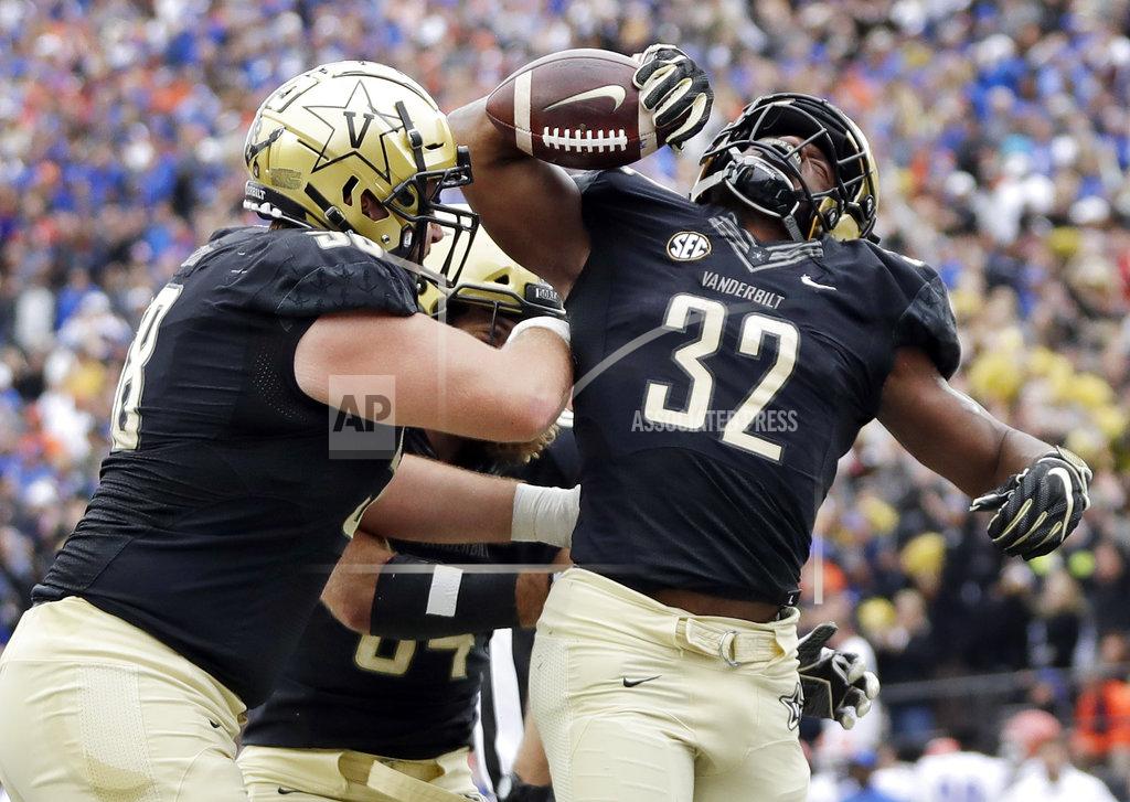Mark Humphrey Vanderbilt running back Jamauri Wakefield (32) celebrates after scoring a touchdown against Florida in the first half of an NCAA college football game Saturday, Oct. 13, 2018, in Nashville, Tenn. (AP Photo/Mark Humphrey)