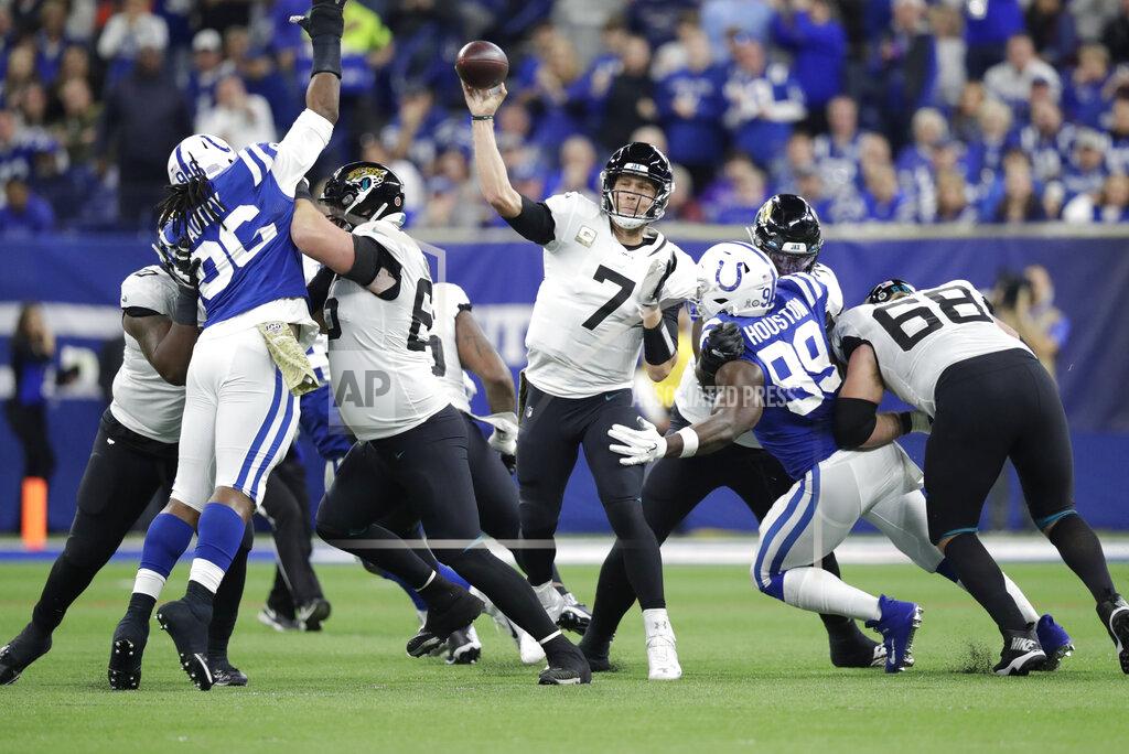 Michael Conroy Jacksonville Jaguars quarterback Nick Foles (7) throws a touchdown pass during the first half of an NFL football game against the Indianapolis Colts, Sunday, Nov. 17, 2019, in Indianapolis. (AP Photo/Michael Conroy)