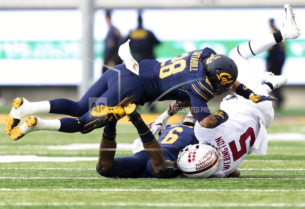 John Hefti Stanford wide receiver Connor Wedington (5) is tackled by California safety Quentin Tartabull (28) in the third quarter of a football game in Berkeley, Calif., Saturday, Dec. 1, 2018. (AP Photo/John Hefti)