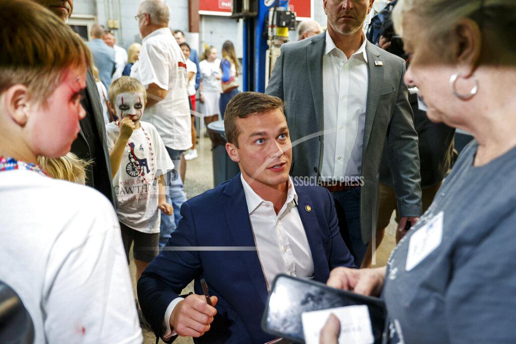 Nell Redmond Rep. Madison Cawthorn, R-N.C., talks to supporters at his primary election night watch party in Hendersonville, N.C., May 17, 2022. (AP Photo/Nell Redmond, File)