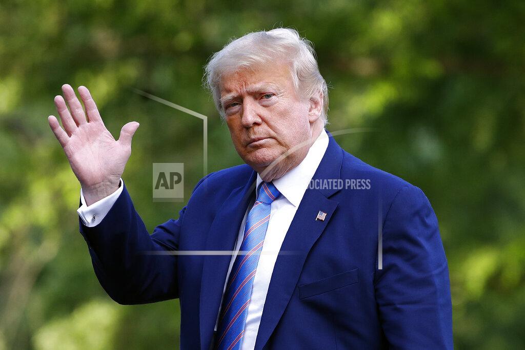 Patrick Semansky President Donald Trump walks on the South Lawn of the White House in Washington, Sunday, June 14, 2020, after stepping off Marine One as he returns from his golf club in New Jersey. (AP Photo/Patrick Semansky)
