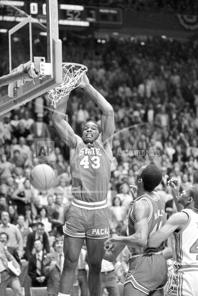 Uncredited FILE - In this April 4, 1983, file photo, North Carolina State's Lorenzo Charles (43) dunks the ball to give N.C. State a 54-52 win over Houston in the NCAA Final Four college basketball championship game in Albuquerque, N.M. The airball-turned-buzzer-beating dunk stunned top-ranked Houston. (AP Photo/File)