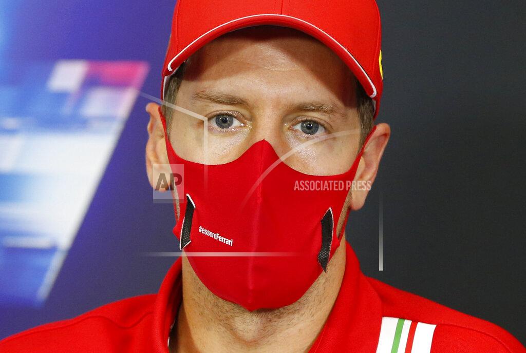 Antonin Vincent Ferrari driver Sebastian Vettel of Germany attends a news conference at the Istanbul Park circuit racetrack in Istanbul, Thursday, Nov. 12, 2020, ahead of the Formula One Turkish Grand Prix that will take place on Sunday. (Antonin Vincent/Pool via AP)