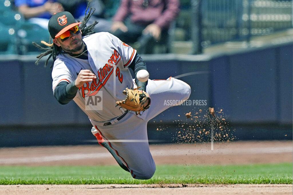 Kathy Willens Baltimore Orioles shortstop Freddy Galvis (2) throws to second to hold the runner on base during the third inning of a baseball game against the New York Mets, Wednesday, May 12, 2021, in New York. (AP Photo/Kathy Willens)