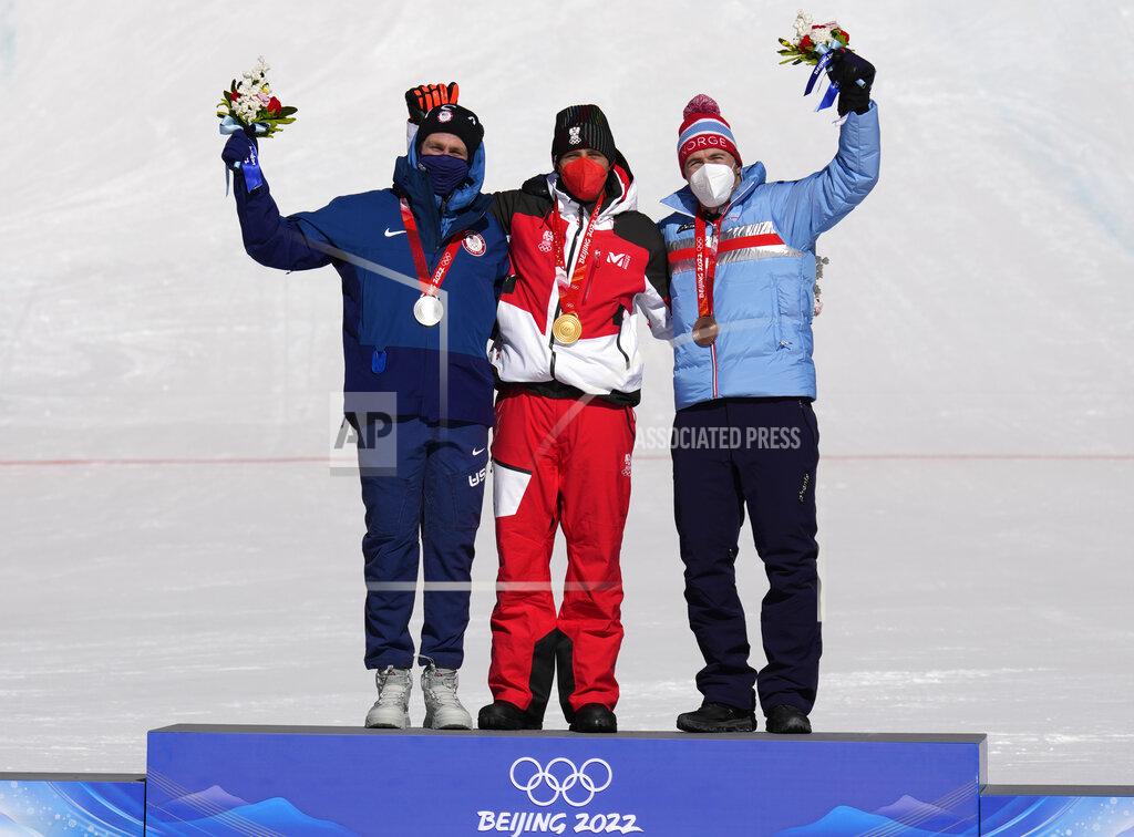 Luca Bruno From left, Ryan Cochran-Siegle of the United States, silver, Matthias Mayer of Austria, gold, and Aleksander Aamodt Kilde of Norway, bronze, celebrate during the medal ceremony for the men's super-G at the 2022 Winter Olympics, Tuesday, Feb. 8, 2022, in the Yanqing district of Beijing. (AP Photo/Luca Bruno)