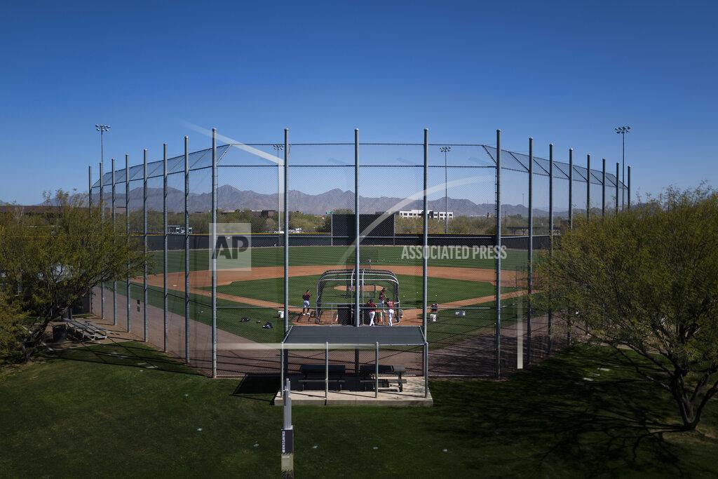 Jae C. Hong Arizona Diamondbacks players take batting practice during the team's spring training baseball workout in Scottsdale, Ariz., Thursday, Feb. 25, 2021. (AP Photo/Jae C. Hong)