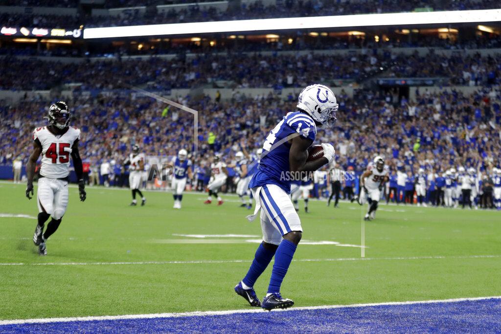 Michael Conroy Indianapolis Colts wide receiver Zach Pascal (14) makes a touchdown reception during the first half of an NFL football game against the Atlanta Falcons, Sunday, Sept. 22, 2019, in Indianapolis. (AP Photo/Michael Conroy)