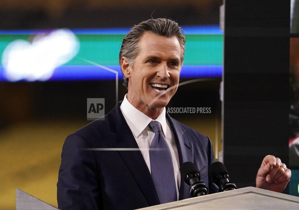Mark J. Terrill FILE - In this Tuesday, March 9, 2021, file photo, California Gov. Gavin Newsom delivers his State of the State address from Dodger Stadium in Los Angeles. Newsom and his Democratic allies launched a political committee Monday, March 15 to stop a proposed recall election that could oust him from office. (AP Photo/Mark J. Terrill, File)