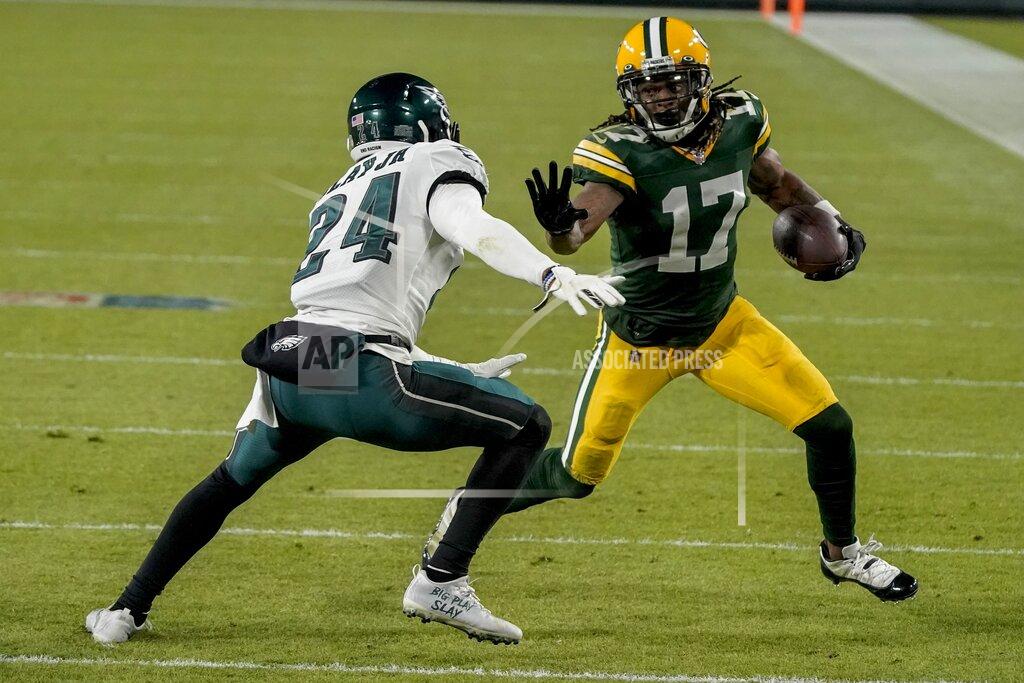 Morry Gash Green Bay Packers' Davante Adams gets past Philadelphia Eagles' Darius Slay for a touchdown during the second half of an NFL football game Sunday, Dec. 6, 2020, in Green Bay, Wis. The pass was Aaron Rodgers' 400th career touchdown pass. (AP Photo/Morry Gash)